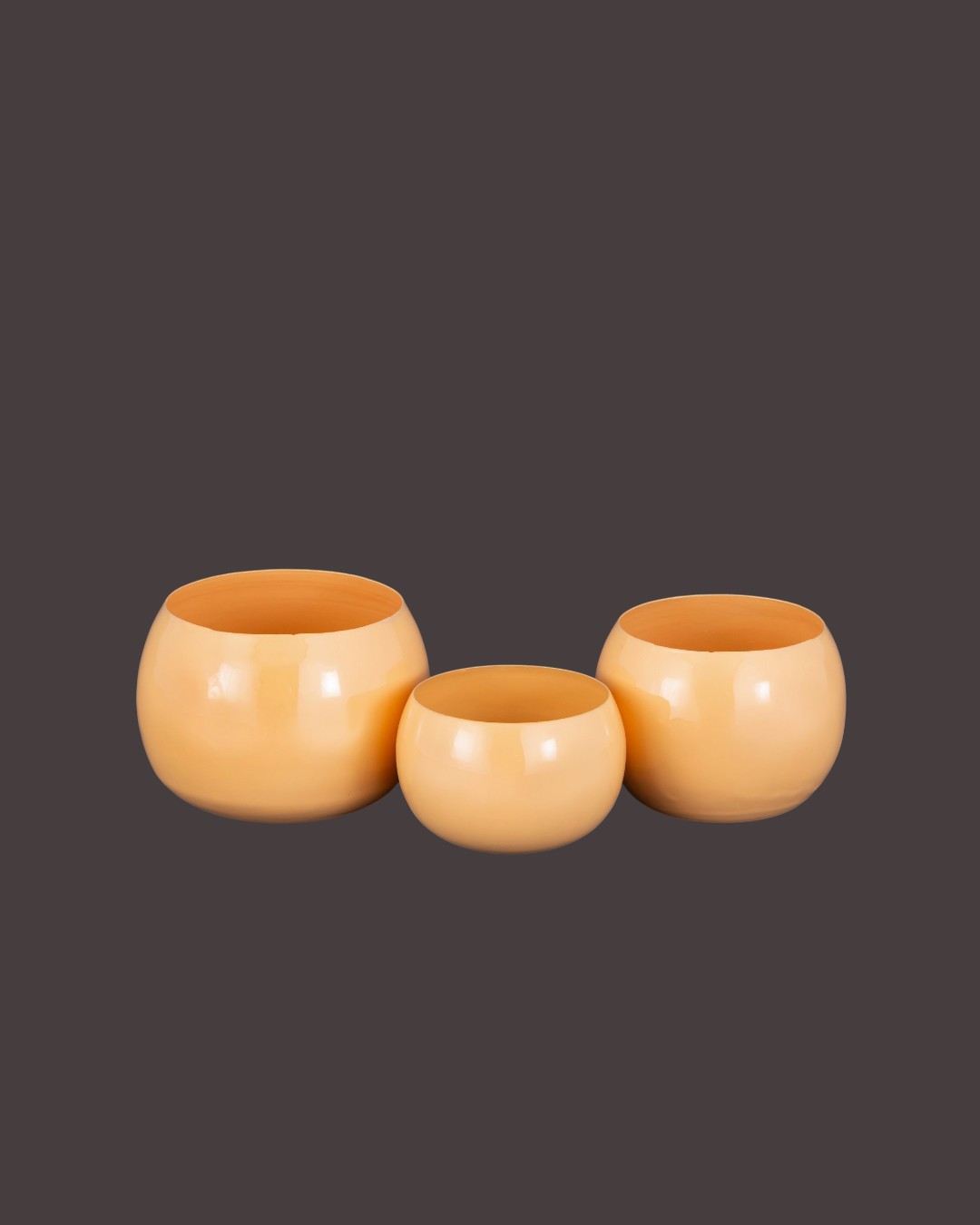 Trio of Spherical Peach Vessels