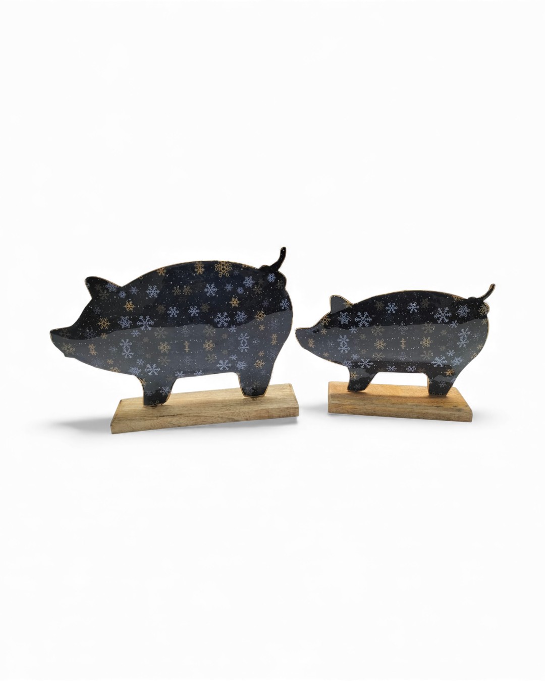 Winter-Patterned Pig Silhouettes on Wood Stands
